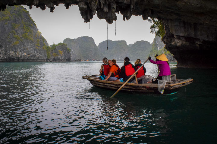 Paddling through Caves in Halong Bay Cruise