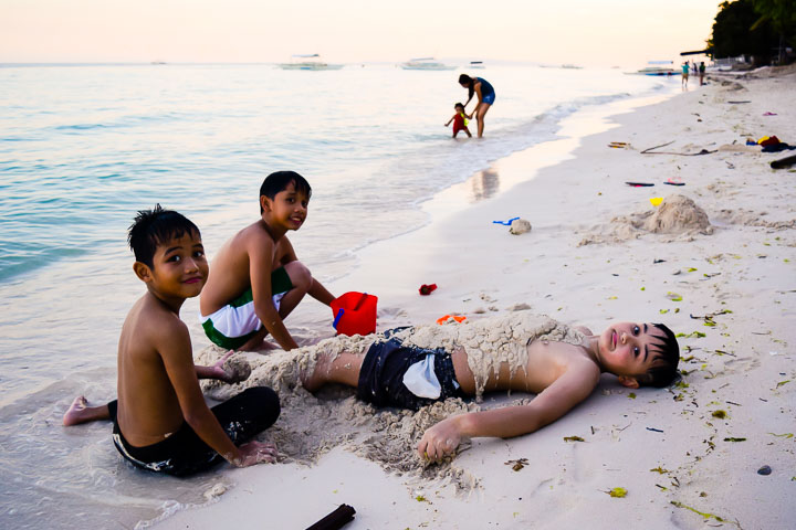 kids playing on White Beach, Panglao Island, Bohol, Philippines