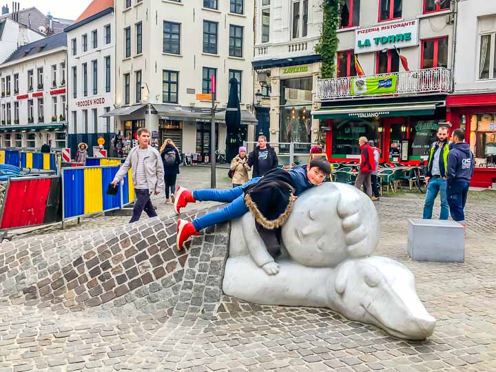 uxembour to amsterdam bus trip statue in Antwerp